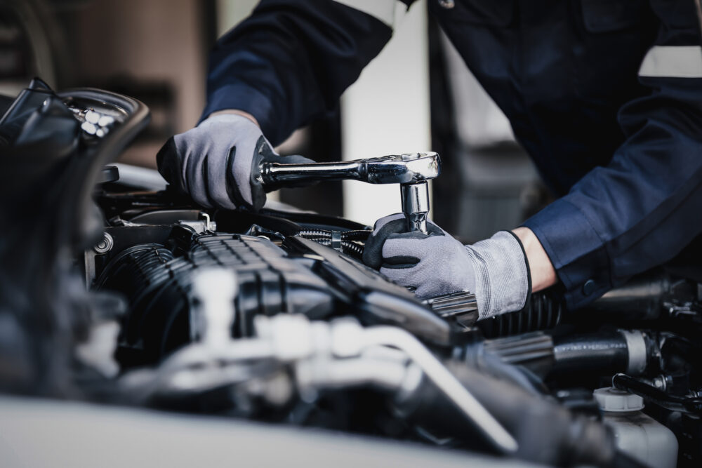 Mechanic working on engine